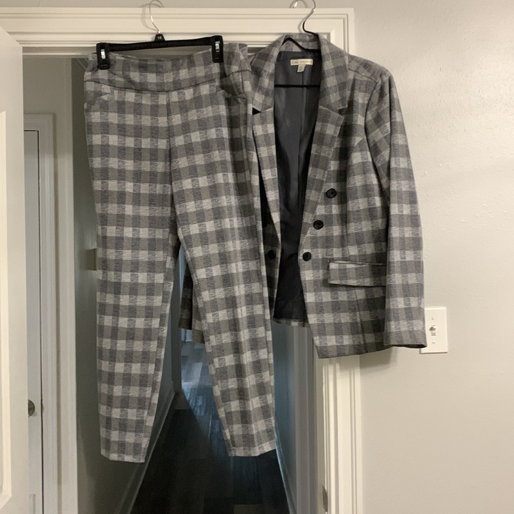 Gray with white/navy stripes pantsuit. Jacket is an XL  pants are Medium